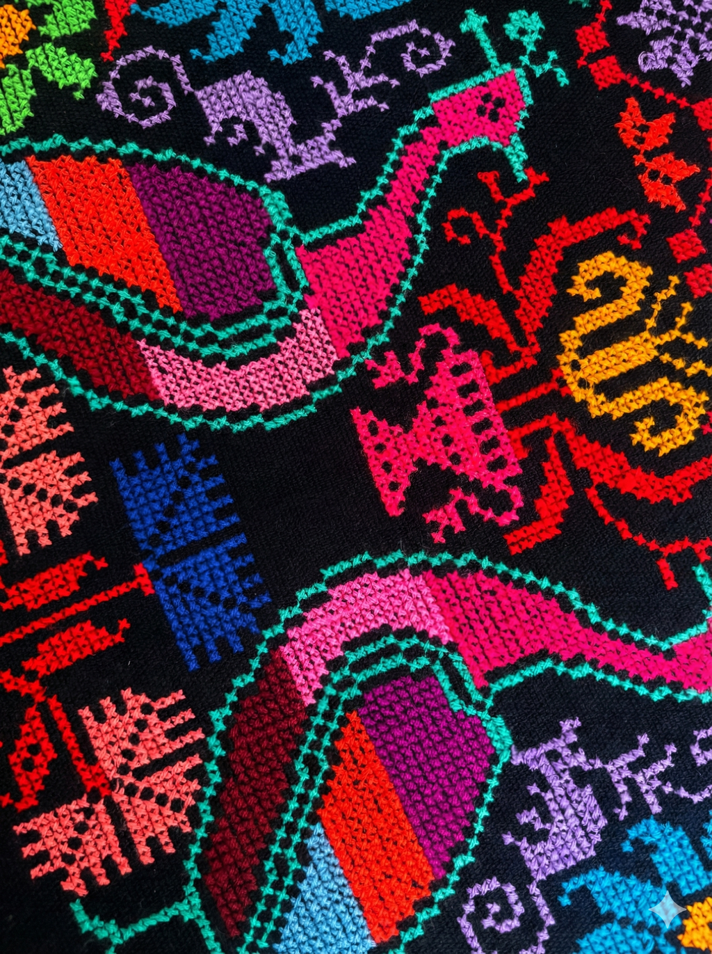 Hand-woven shawl with cross stitch